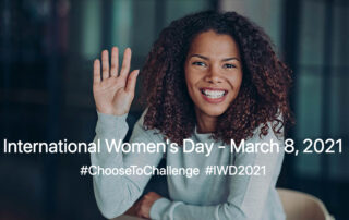 Woman holding up her hand for international womens day 2021